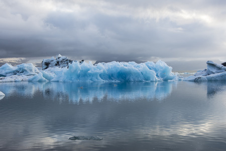 Iceberg in Jokulsarlon glacier lake in Iceland. The icebergs, originating from the Vatnajokull...