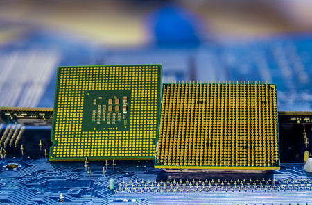 Technology background with computer processors CPU concept blue circuit board textureの写真素材