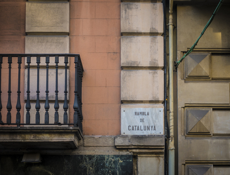Street sign indicating to the public they are in Rambla de Catalunya, Barcelona, Spain