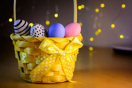 Easter eggs in a basket ready for be hidden for children to find on Easter morning,の写真素材