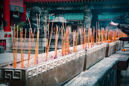 Burning aromatic incense sticks at a Taoist temple of Wong Tai Sin, Hong Kong.の写真素材