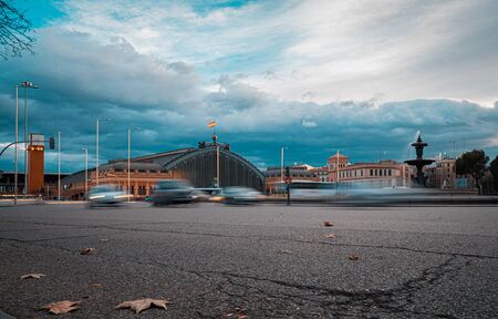 Rush our traffic in the city of Madrid near Atocha train stationの写真素材