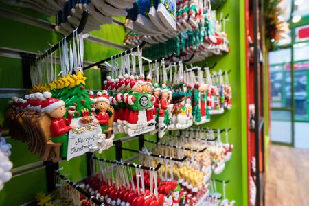 Hanging Christmas ornament decoration kiosk stand on a winter marketのeditorial素材