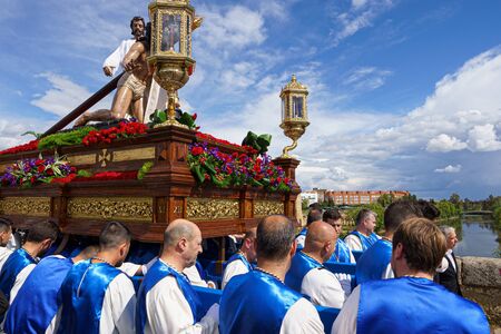 Merida, Spain. April 2019: A group of bearers, called Costaleros, carrying a religious float