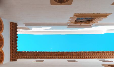 Typical mediterranean houses with white walls against a teal sky. Bottom viewの写真素材