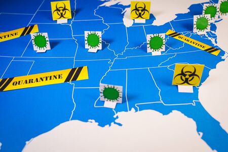 Map of USA with coronavirus and quarantine signs.の写真素材