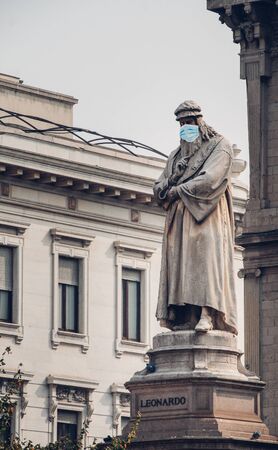 Leonardo statue in Milan with a surgical maskの写真素材