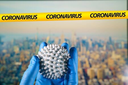 Coronavirus ball with NYC skyline on the backgroundの写真素材