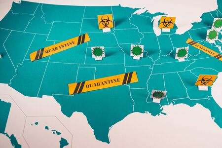 Map of USA with coronavirus and quarantine signs.の写真素材