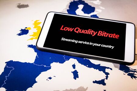 Smartphone with low bitrate message on screen over an EU mapの写真素材