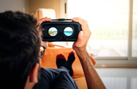 Man using VR headset and doing Virtual reality travelの写真素材