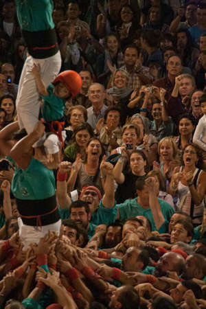 Reus, Spain. October 2009: Castellers group of people building a human tower in a traditional festivitieのeditorial素材