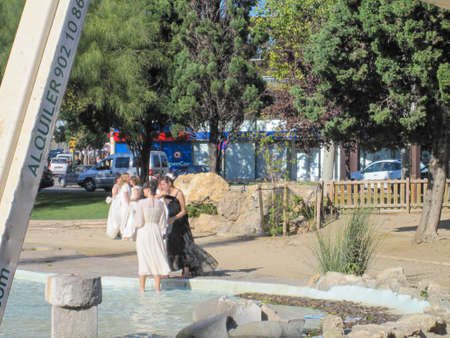 Tarragona, Spain. November 2010:Meeting of women in wedding dresses in Tarragona to take a wedding photo groupのeditorial素材