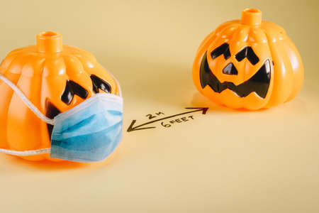 halloween pumpkins keeping social distance. Covid 19 conceptの写真素材