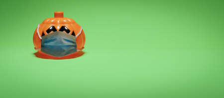 Orange pumpkin wearing a protective medical mask.の写真素材