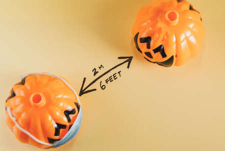 halloween pumpkins keeping social distance. Covid 19 conceptの写真素材