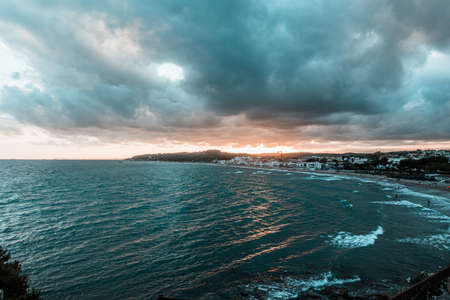 Sunset and Cloudscape in the Mediterranean village of Altafulla, Tarragona province, Spainの写真素材