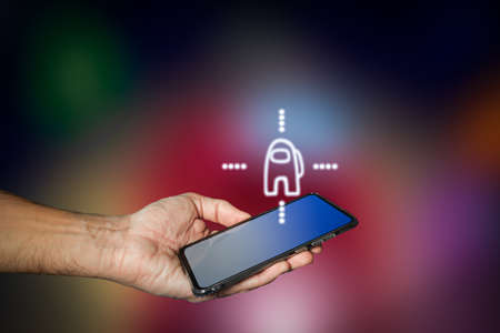 Smartphone with popular game appの写真素材