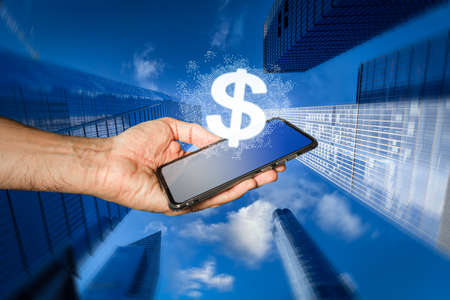 Smartphone with digital US dollar on itの写真素材