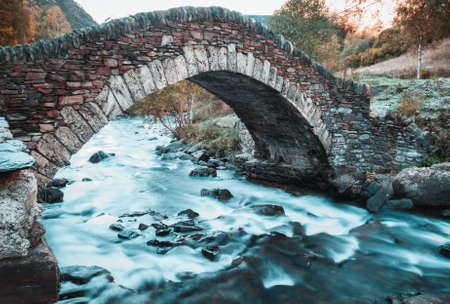 Romanesque bridge of Ordino in the Pyrenees, Andorraの写真素材