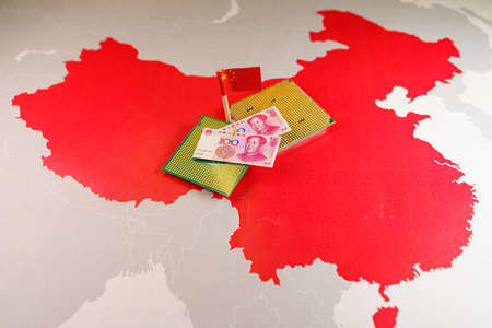CPU and yuan bills over a Chinese map, symbolizing the Digital Yuan.の写真素材