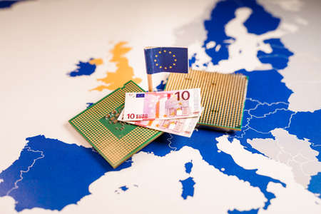 CPU and euro bills over an EU map, symbolizing the Digital Euro.の写真素材