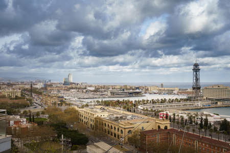 Barcelona, Spain. March 2021: Cityscape top view on Barcelona city from Miramar gardens in Spainのeditorial素材