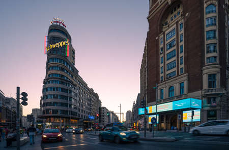 Madrid, Spain - June 2019: Gran via Avenue at the iconic schweppes building.のeditorial素材