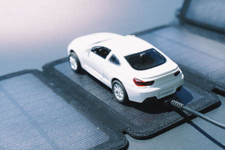 Solar powered electric car and charging concept.の写真素材