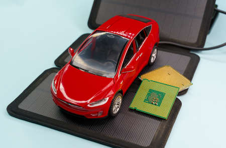 Solar powered electric car and charging concept.の写真素材