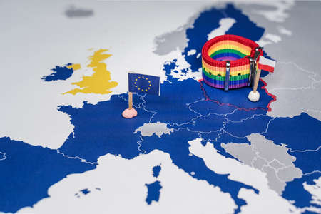 Map of the European Union with an LGBT bracelet on top of Poland, symbolizing homosexual discrimination in that countryの写真素材