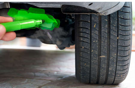 hand painting a car exhaust pipe greenの写真素材