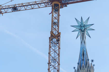 New star on the tower of the Virgin Mary in the Basilica of the Familia. the second tallest of...