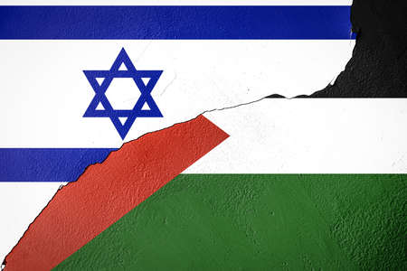 cracked painted wall with Israel and Palestine flagsの写真素材