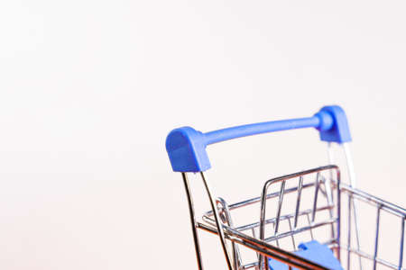 Shopping cart on a white backgroundの写真素材