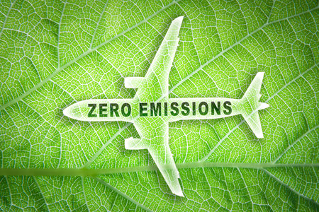 Icon of a commercial airplane with the words zero emissions and a leaf texture in the background.の写真素材