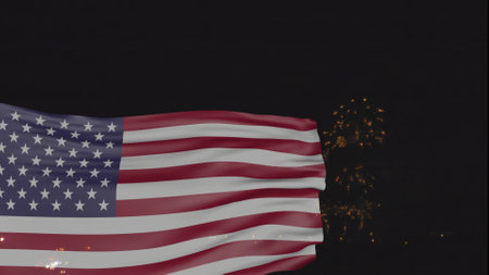 United States national flag waving with night fireworks on the backgroundの写真素材