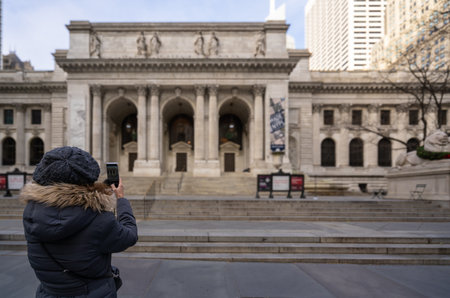 Candid Tourist Moment: Iconic NYC Library Smartphone Snapshot