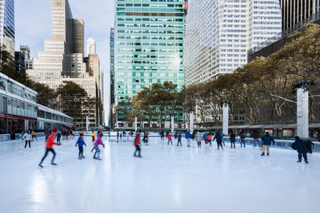 Annual Christmas market in Bryant Park under the skyscrapersのeditorial素材