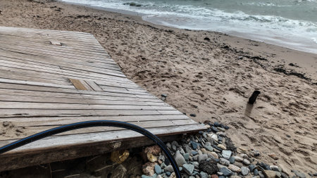Effects of climate change on beaches, changes in storms and storms affect the destruction of the coastlineの写真素材