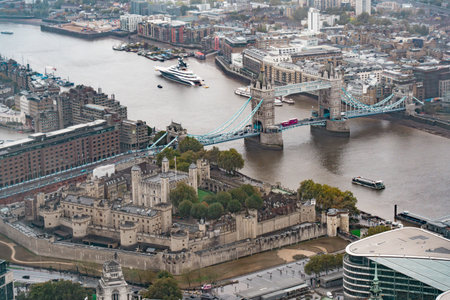 Aerial View of Tower Bridge, River Thames, and Tower of London on a Rainy Day