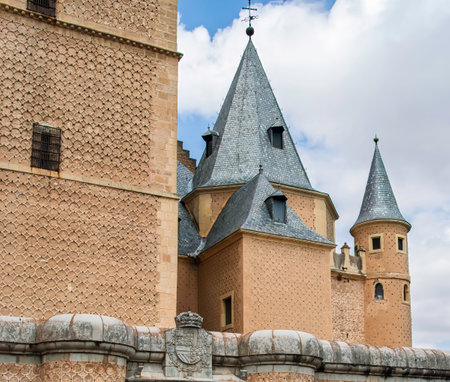 Alcazar of segovia showing its majestic slate roofs and turretsの写真素材