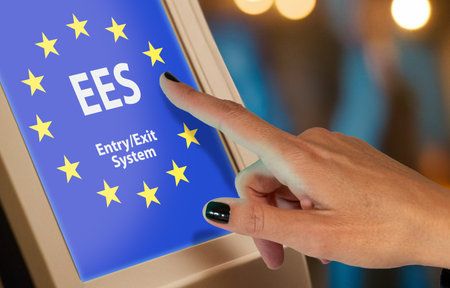 Woman using EES EntryExit System at European Union Border Controlの写真素材