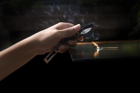 Burning match with the light of the sun, Experimental.の写真素材