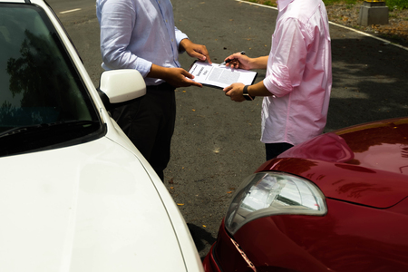 The insurance agent working claim process in payment on from parties .Insurance claim concept .の写真素材