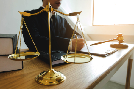 Lawyer working on the table in office. consultant lawyer, attorney, court judge, concept.の写真素材