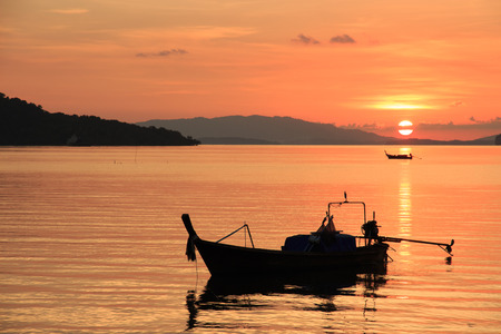 Sunset with boatの写真素材