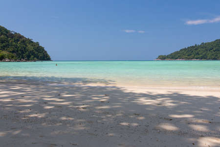 Shore with clear sky and seaの写真素材