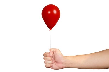 Close up of Men Hand holding red balloon for giving isolated on a white background. Happy holiday concept. Valentine's Day.の写真素材