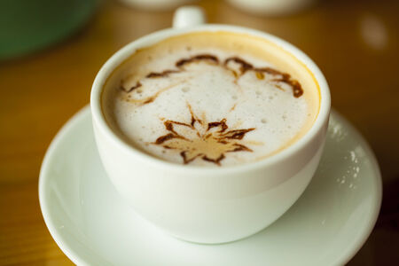 A cup of cappuccino coffeeの写真素材